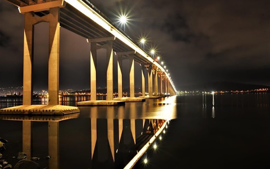 Tasman Bridge lit up at nighttime 