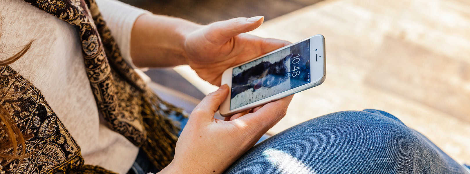 Person checking their mobile phone.