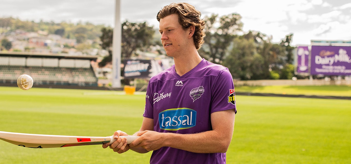 Mitch Owen of the Hurricanes practicing with bat and ball at Bellerive Oval
