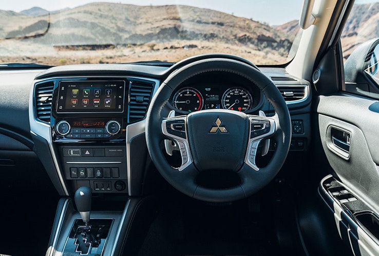 Steering wheel and front interior of Mitsubishi Triton