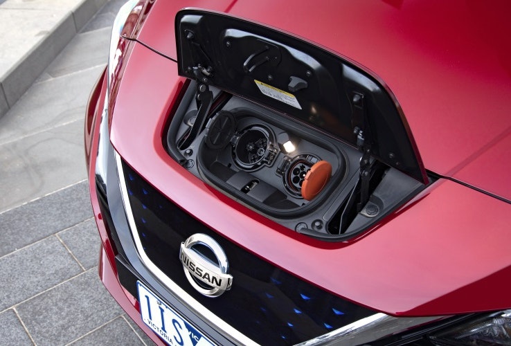 Nissan Leaf charging sockets in front of car