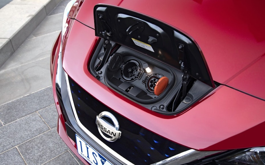 Nissan Leaf charging sockets in front of car