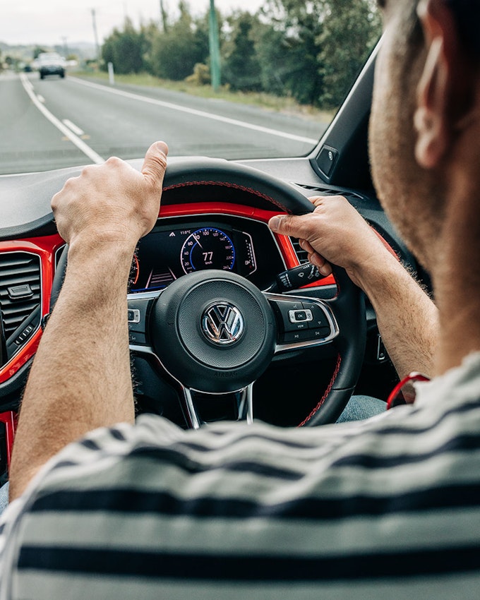 Driver behind the wheel.