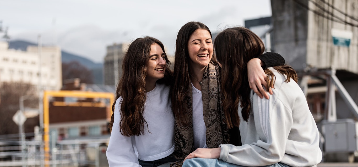 Friends enjoying a chat on Hobart's waterfront