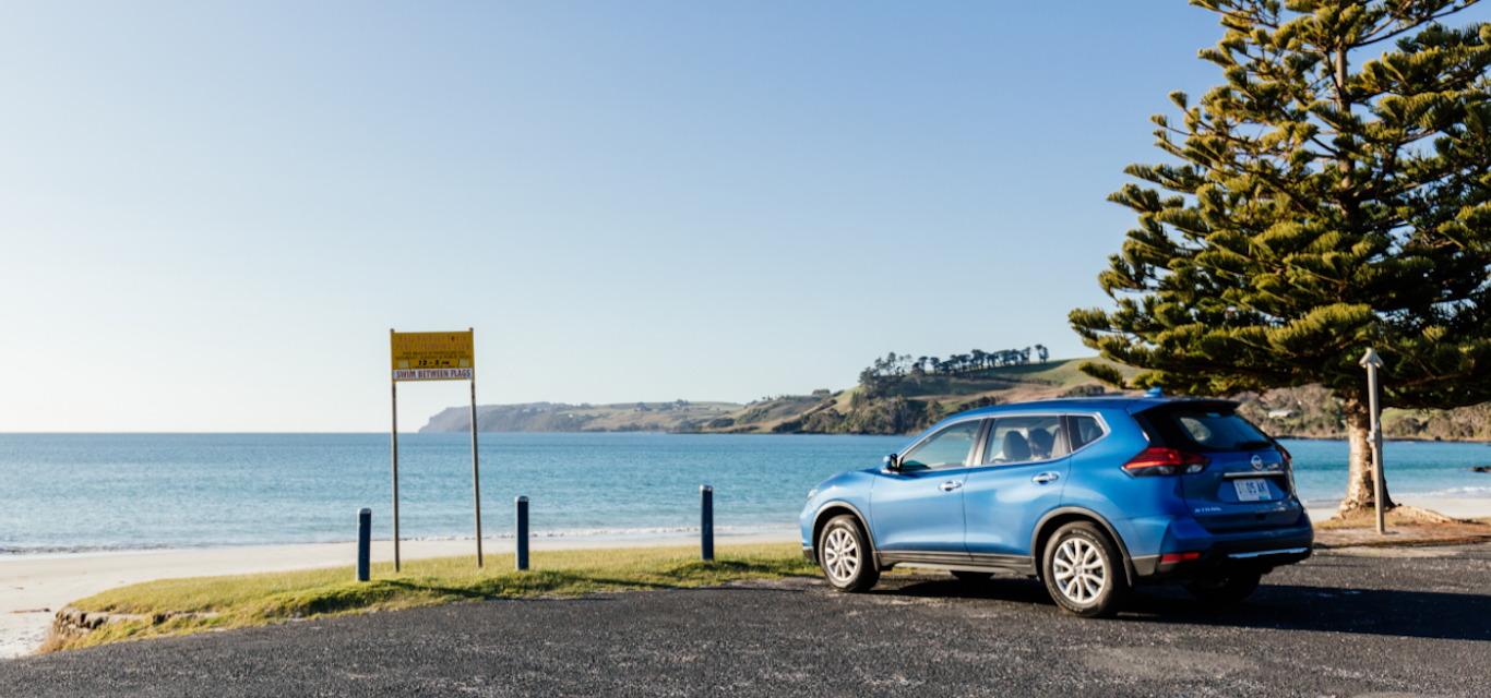 Car parked at beach.