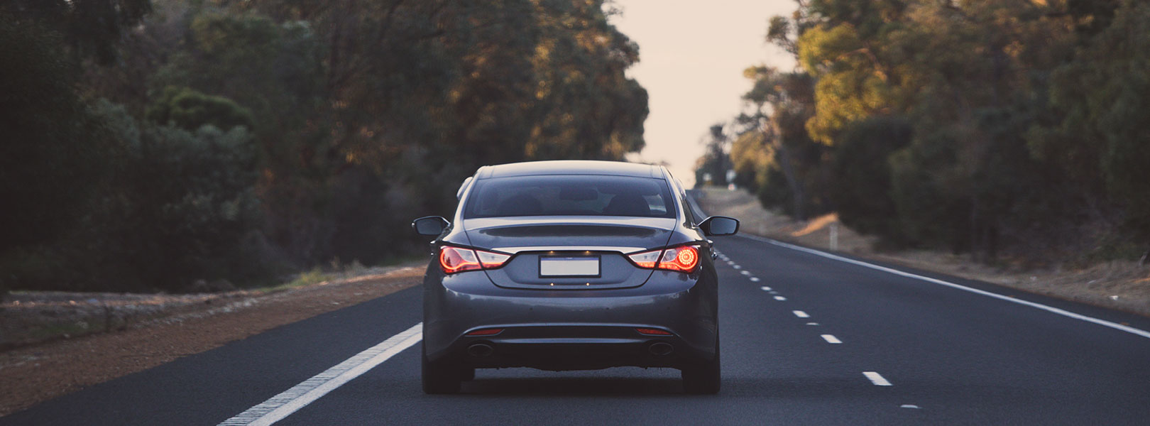 Car driving along road