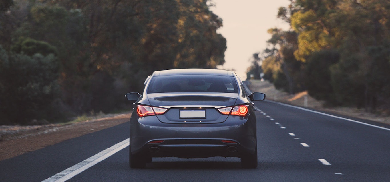 Car driving along road