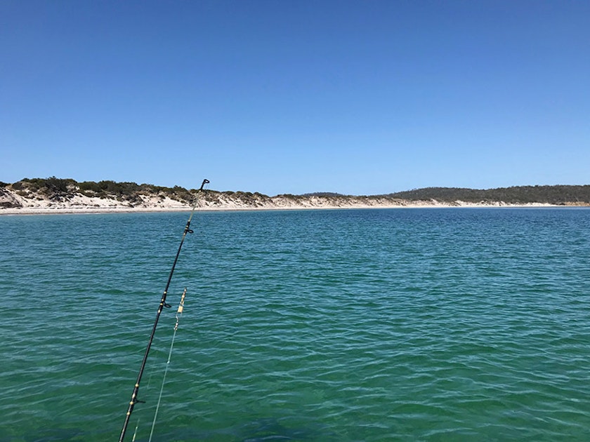 Dropping a line at Lagoon Beach, near Sloping Main.