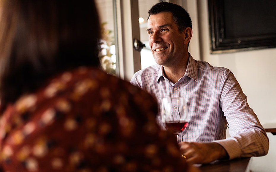 Person with a glass of wine.