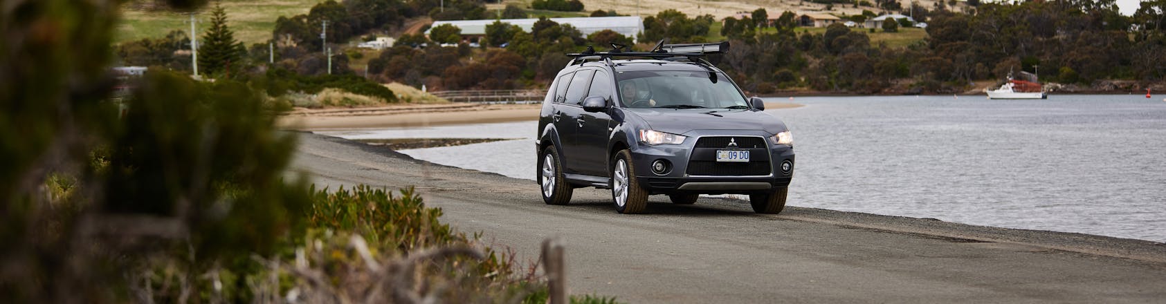 Modern car driving along tasmanian road
