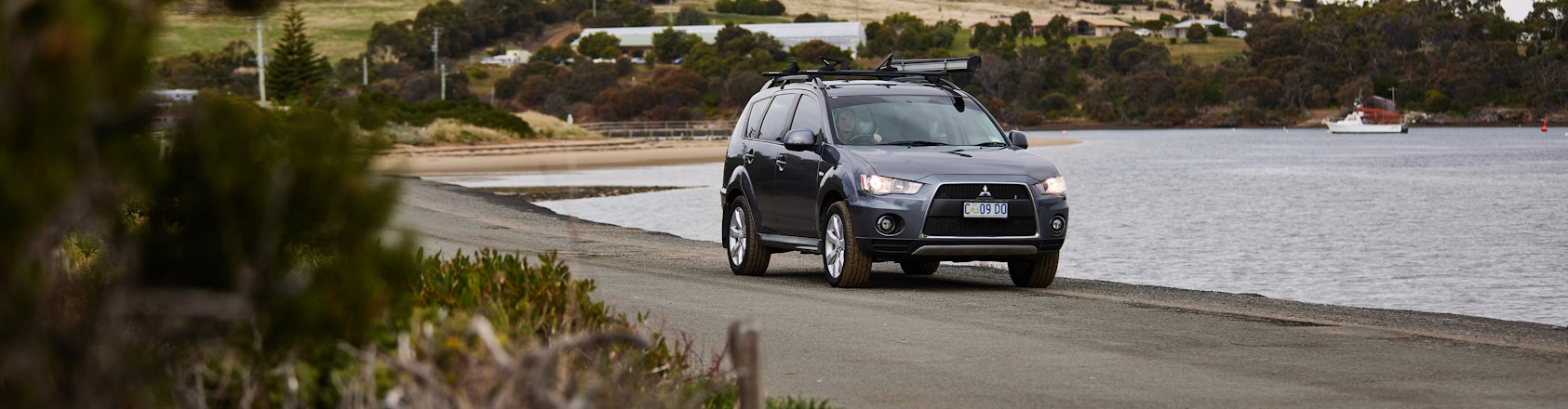 Modern car driving along tasmanian road