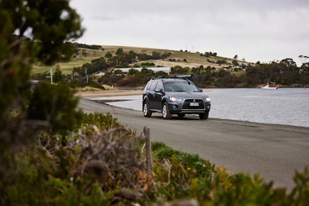 Modern car driving along tasmanian road