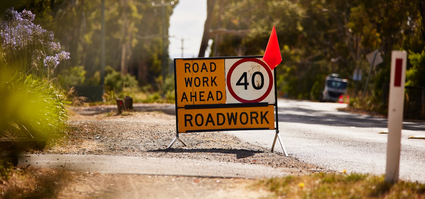 Road words ahead sign 40 speed limit