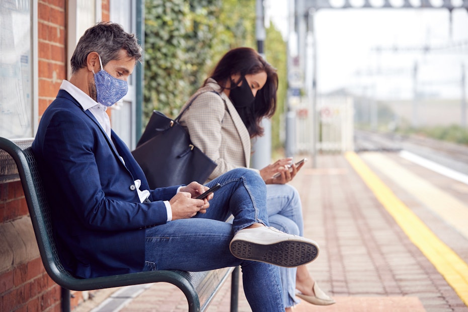 people waiting at train station