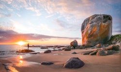 sunrise on rocky beach