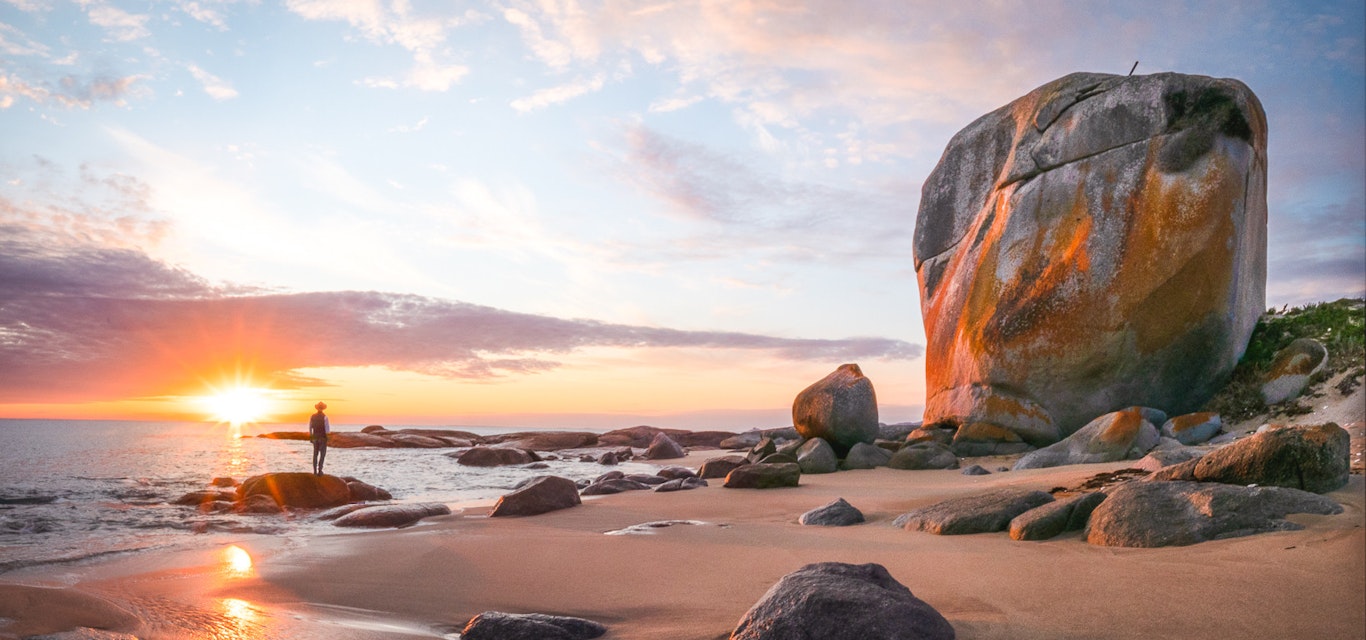 sunrise on rocky beach