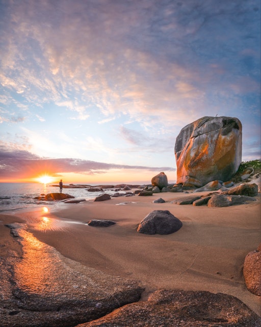 sunrise on rocky beach