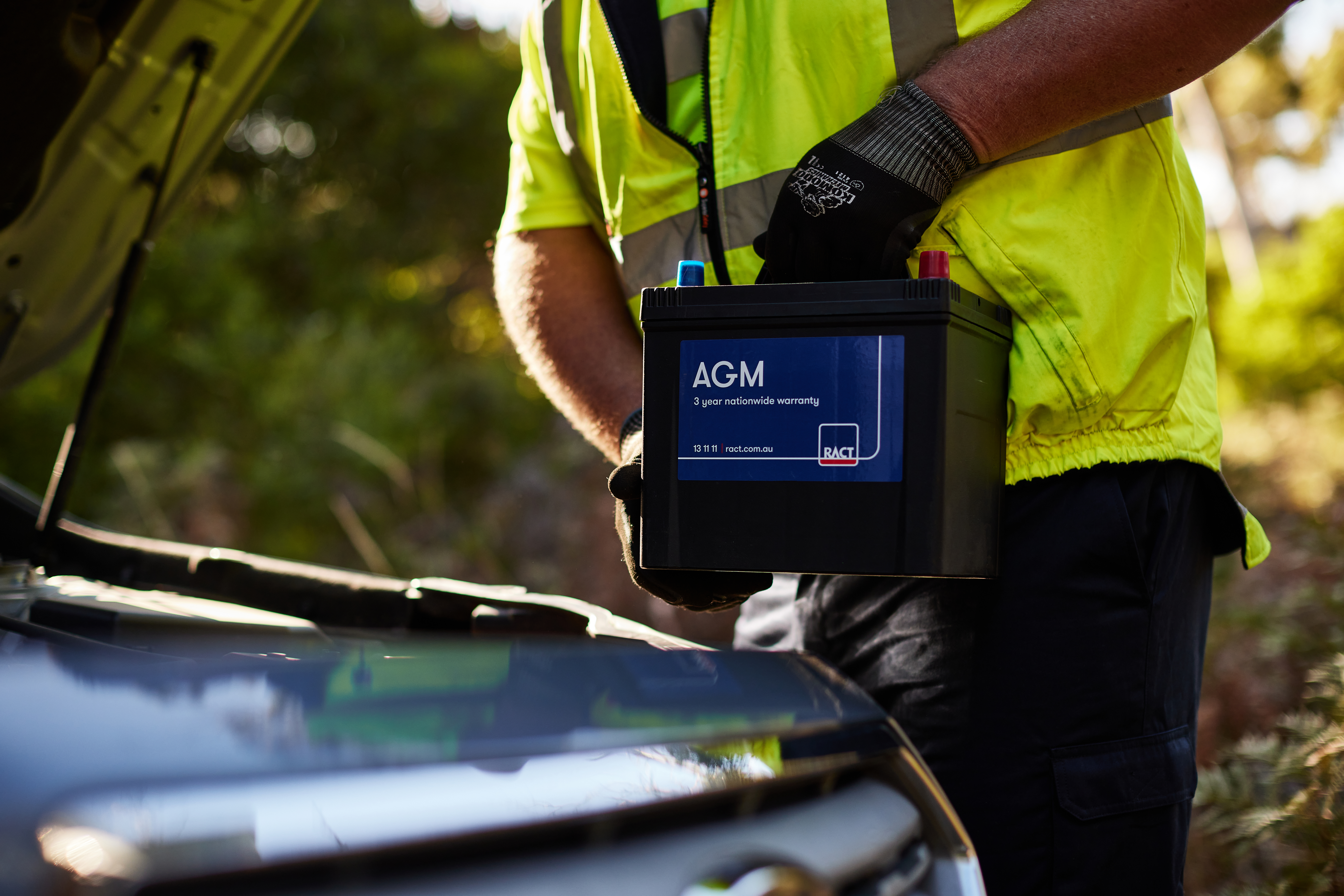 Roadside patrol changing a battery