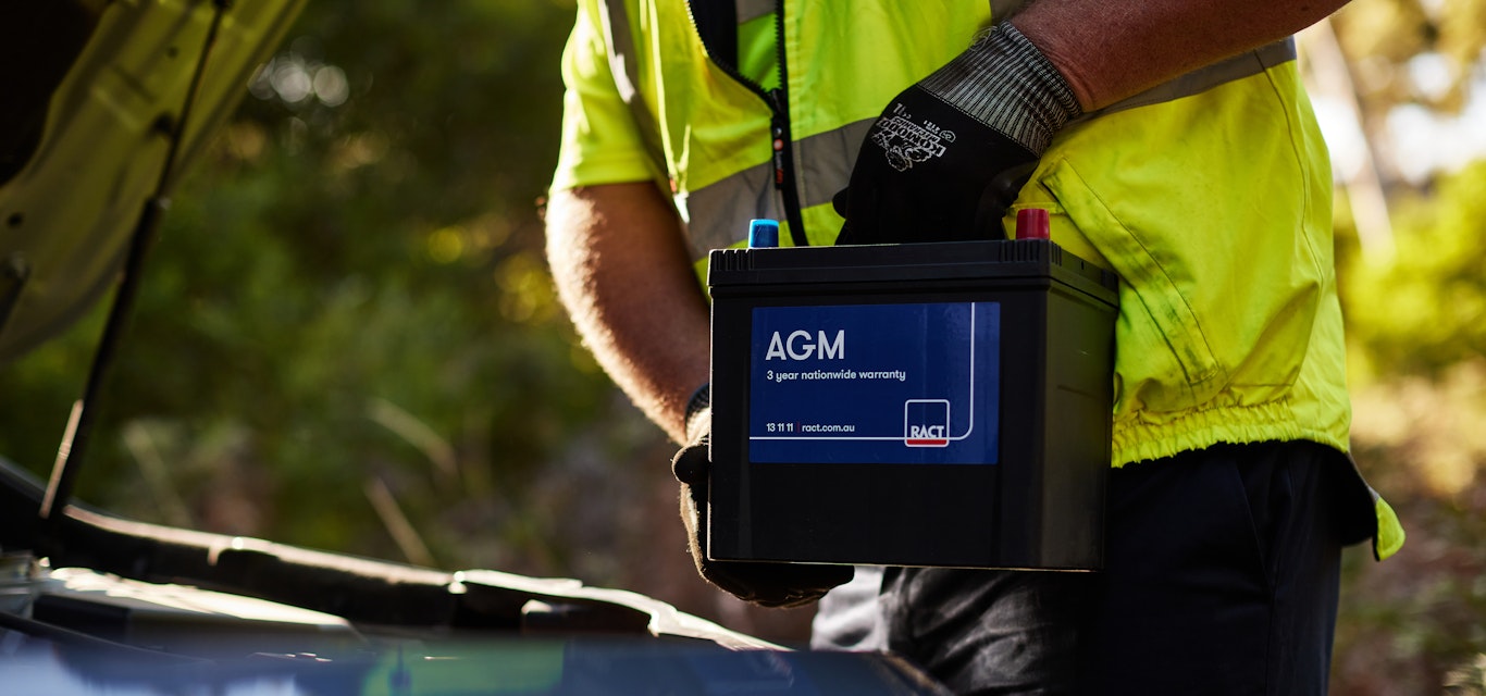 Roadside patrol changing a battery Roadside patrol changing a battery
