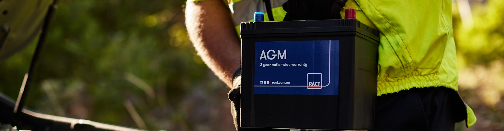 Roadside patrol changing a battery Roadside patrol changing a battery