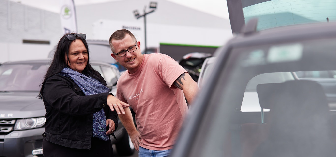 Members shopping for car in Hobart car yard.