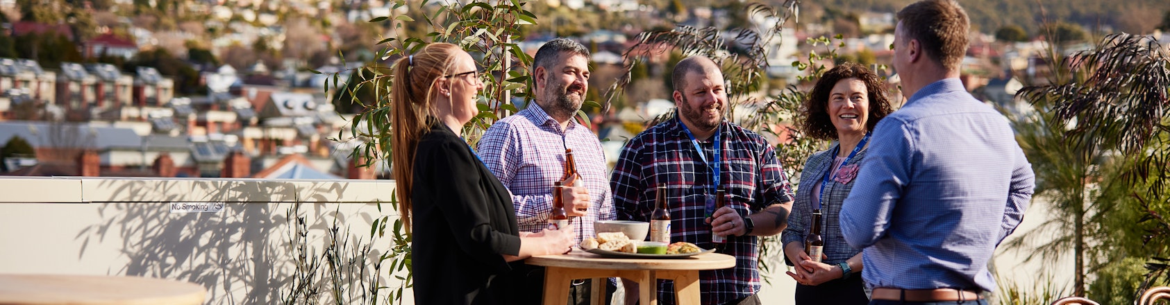 RACT staff chatting on deck