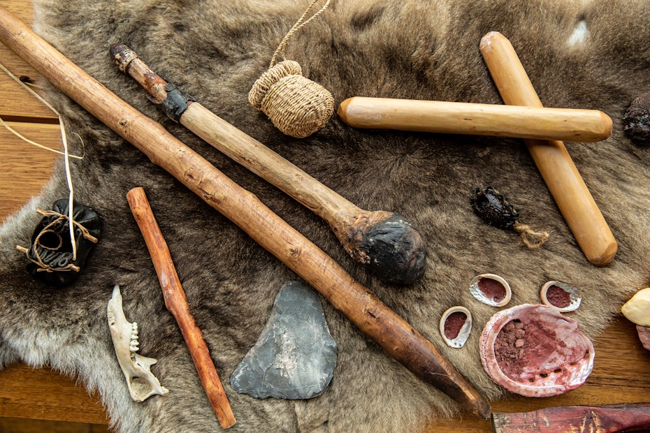 Cultural belongings such as ochre, waddy, clapsticks and a kelp water carrier