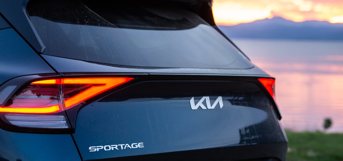 The rear of the Sportage at sunset Rear of Kia Sportage