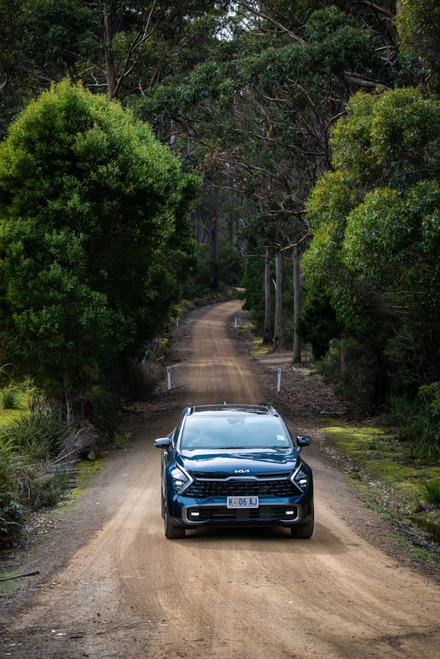 Kia Sportage on gravel road