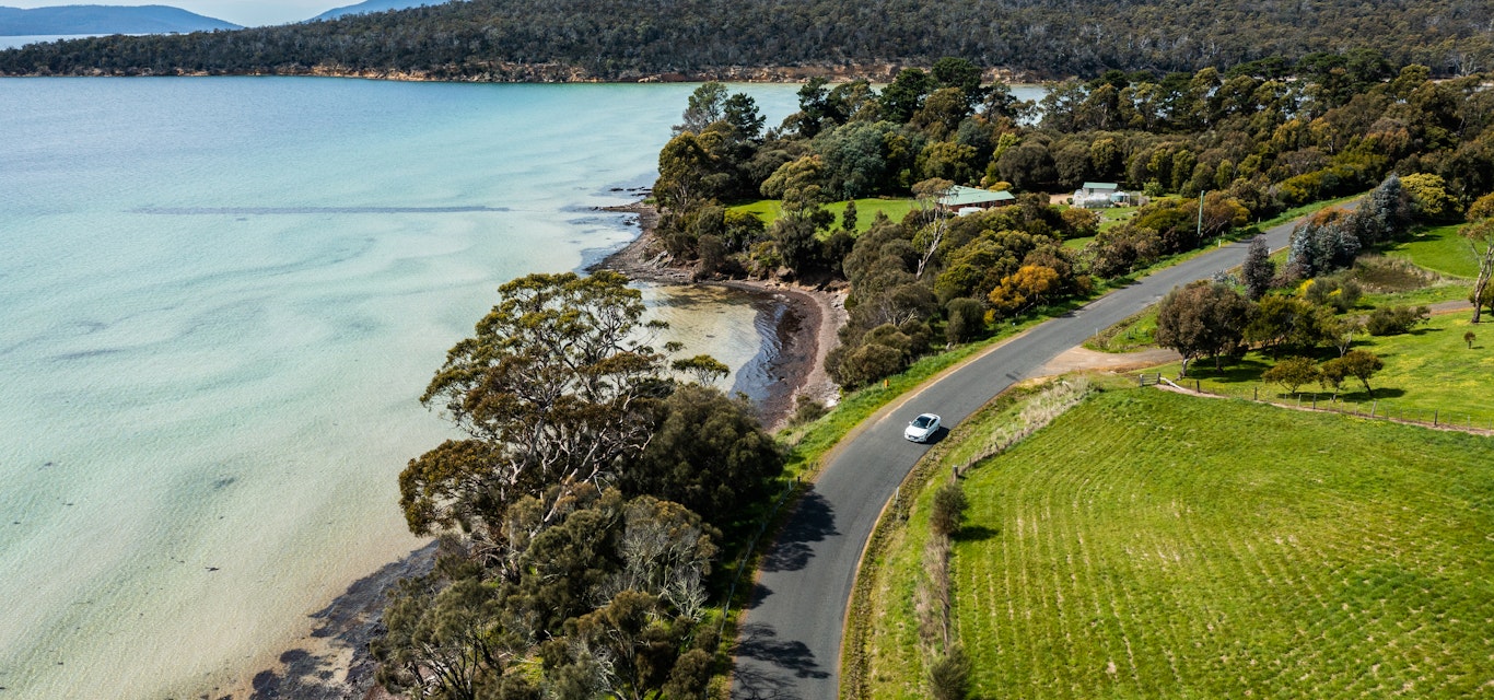The Arteon racking up the km's Drone shot of VW Arteon on coastal road