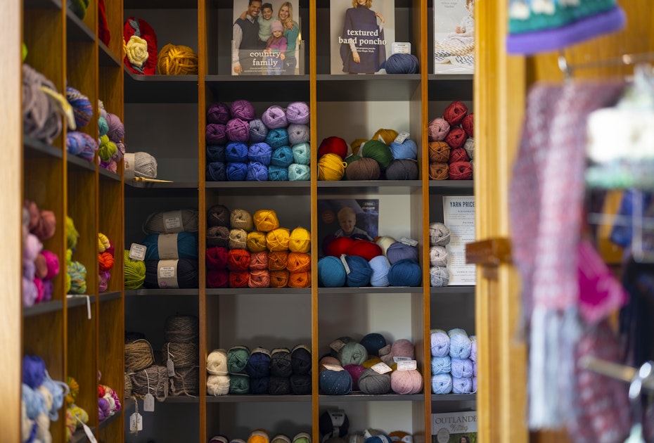 Coloured wool on shelves