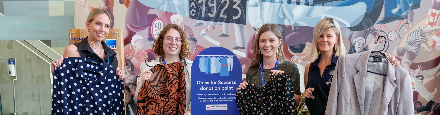dress for success bin and staff