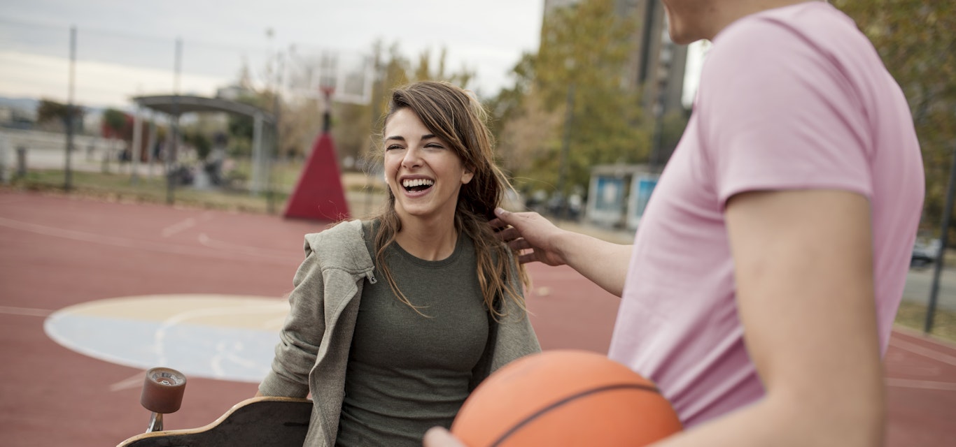 Two people on basketball court