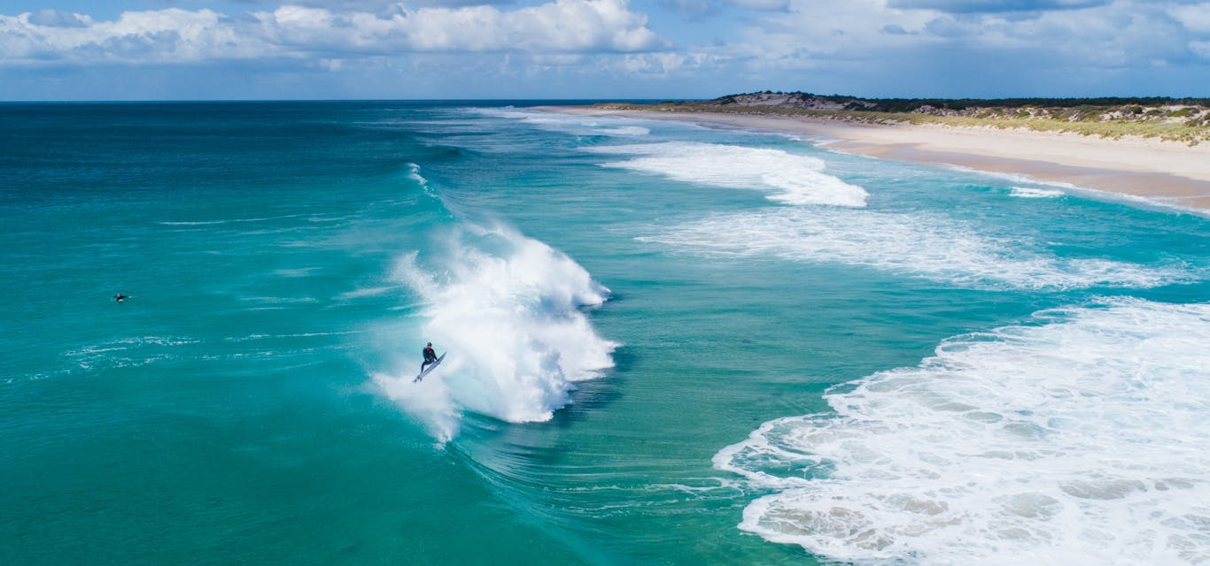 man surfing wave