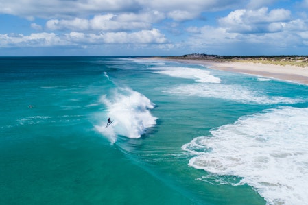 man surfing wave