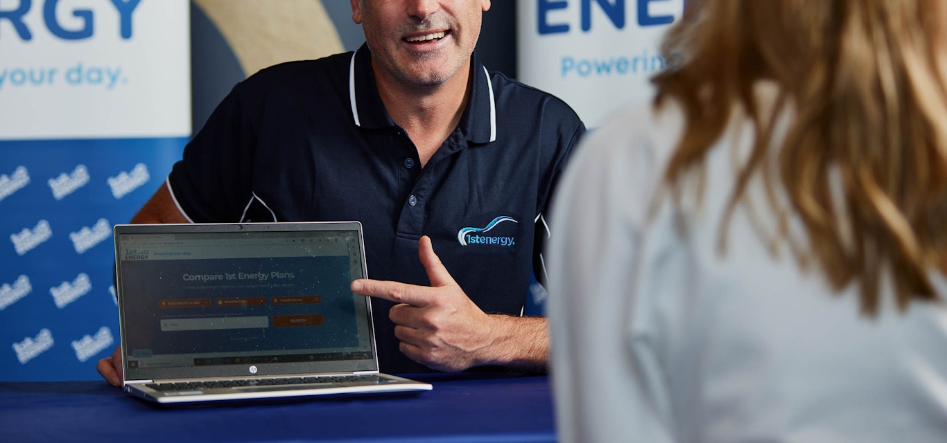 1st Energy rep sitting at table