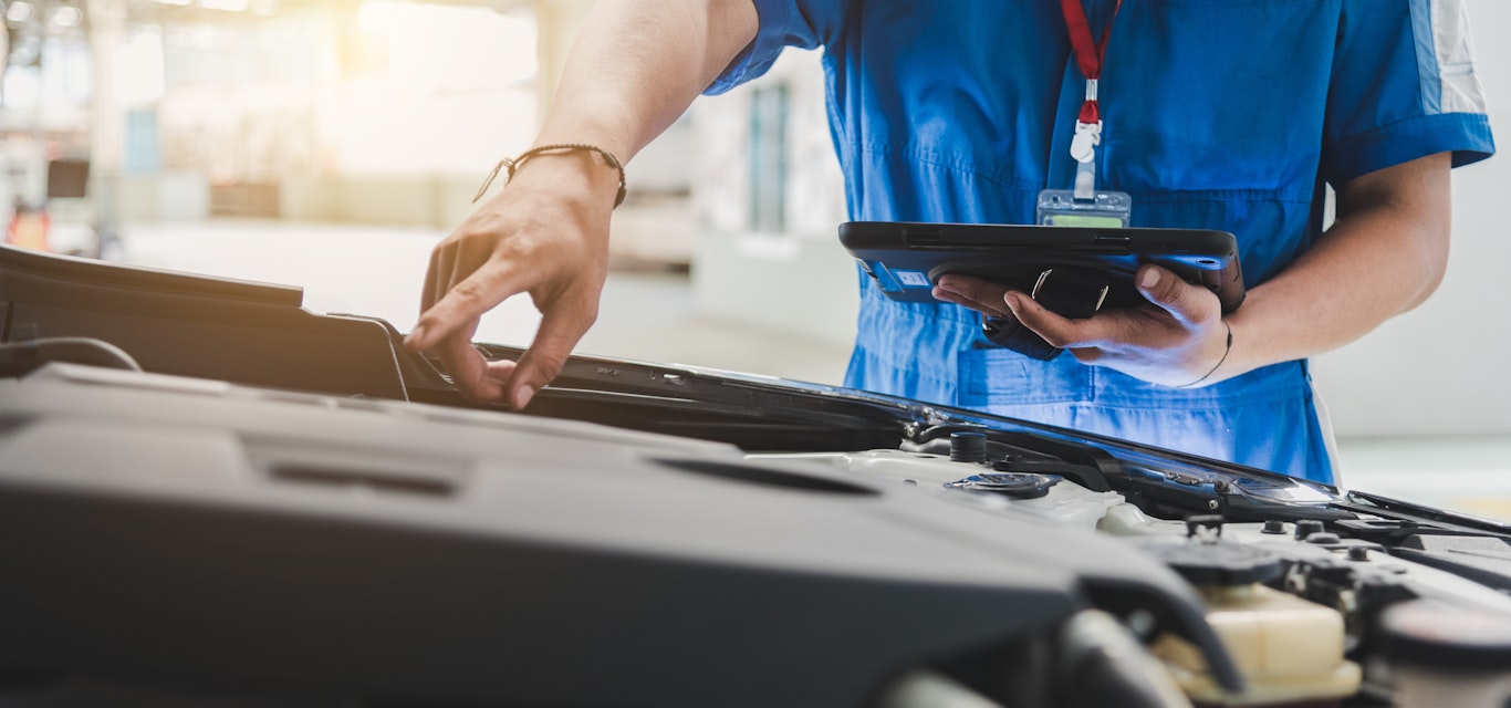 Person point to engine