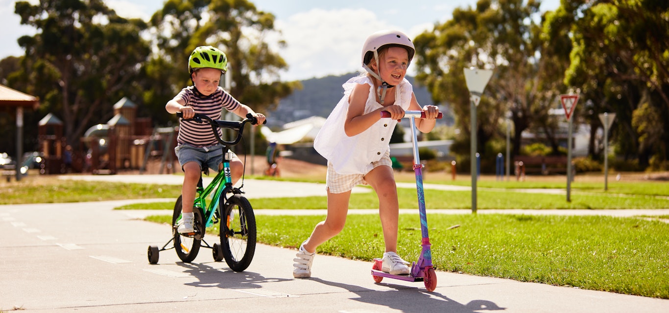 Children on their bike and scooter