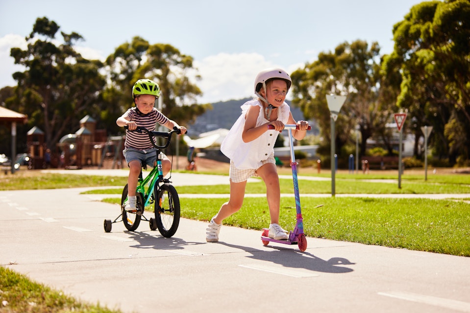 Children on their bike and scooter