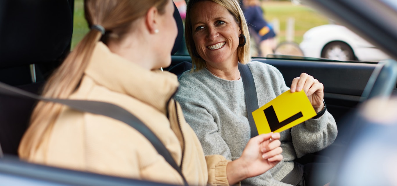 New driver and mum with L plate