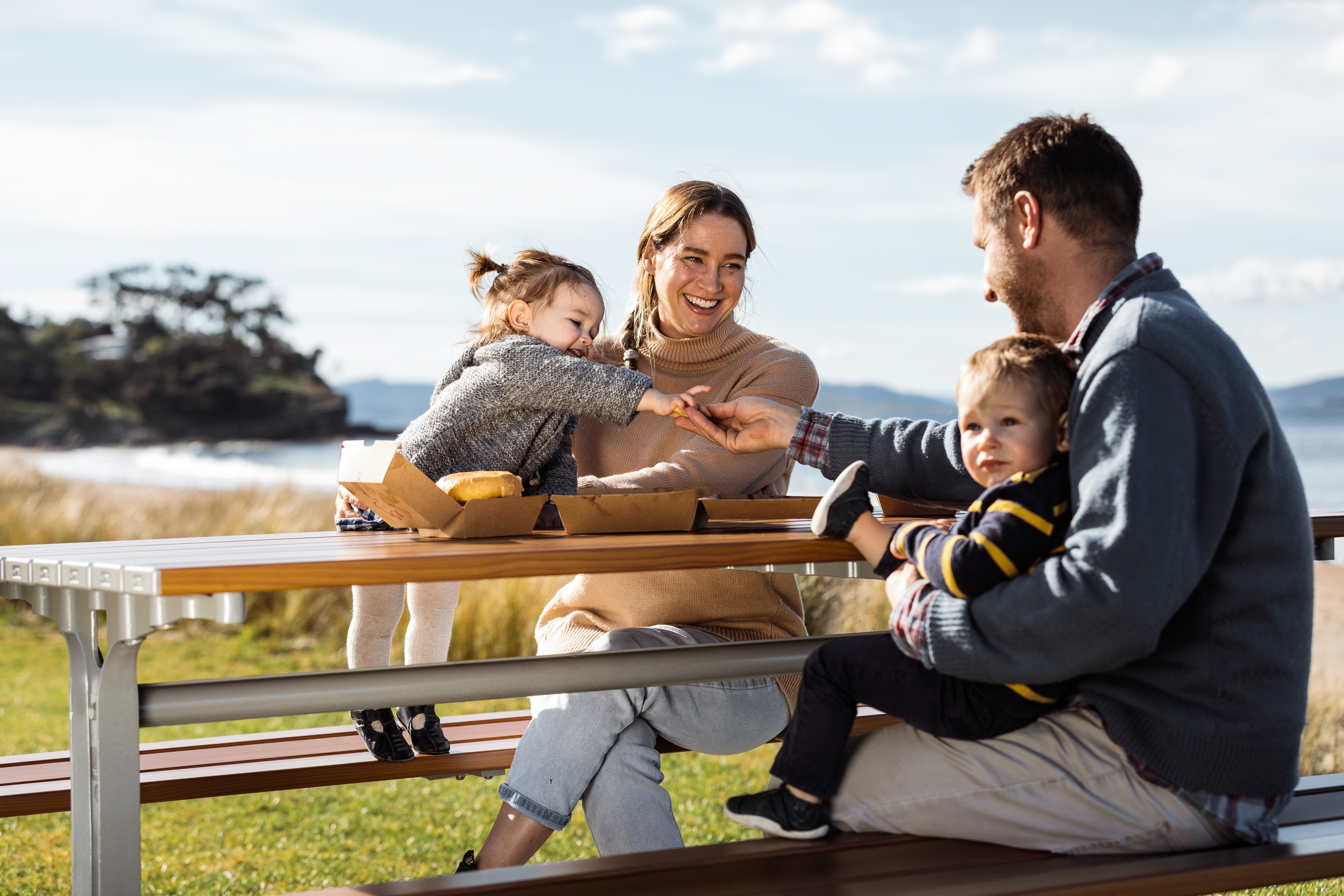 Family eating at the beach