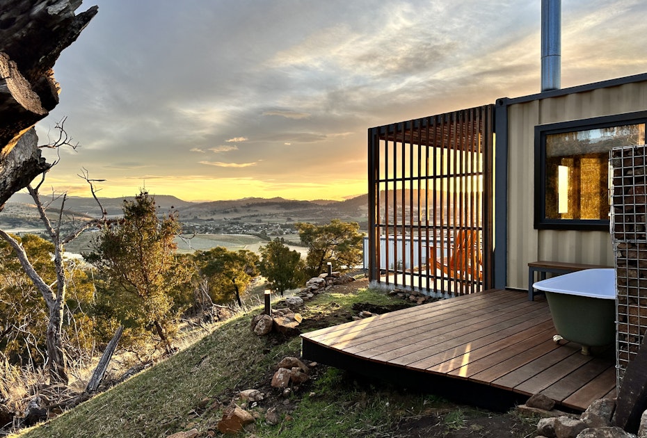 Gaze upon the view from the outdoor bath at Aquila Glamping