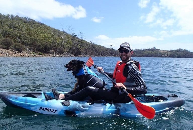 Dog on kayak