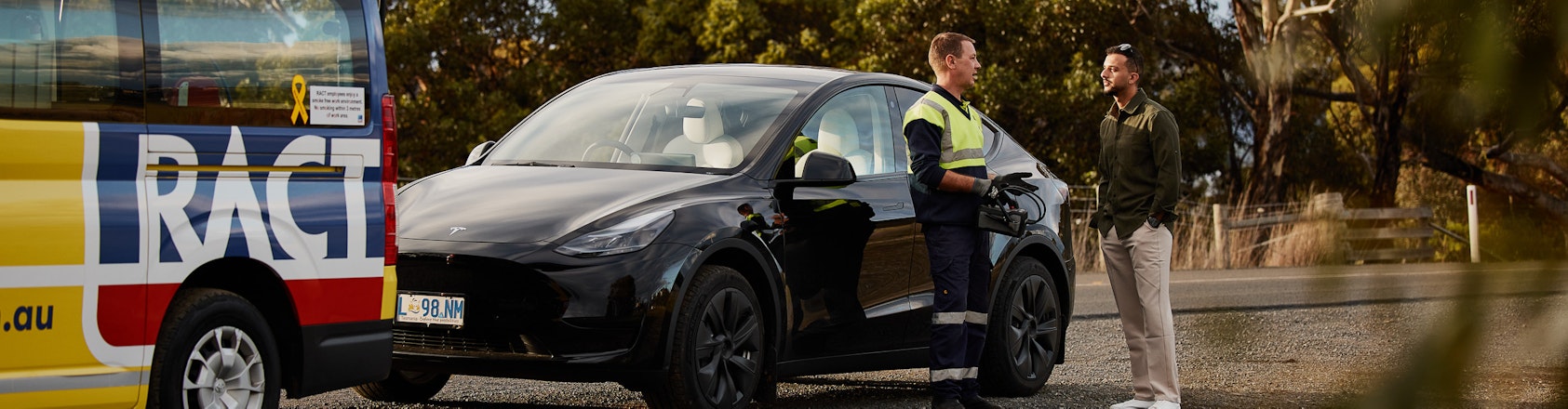 Roadside patrol helping man on the side of the road