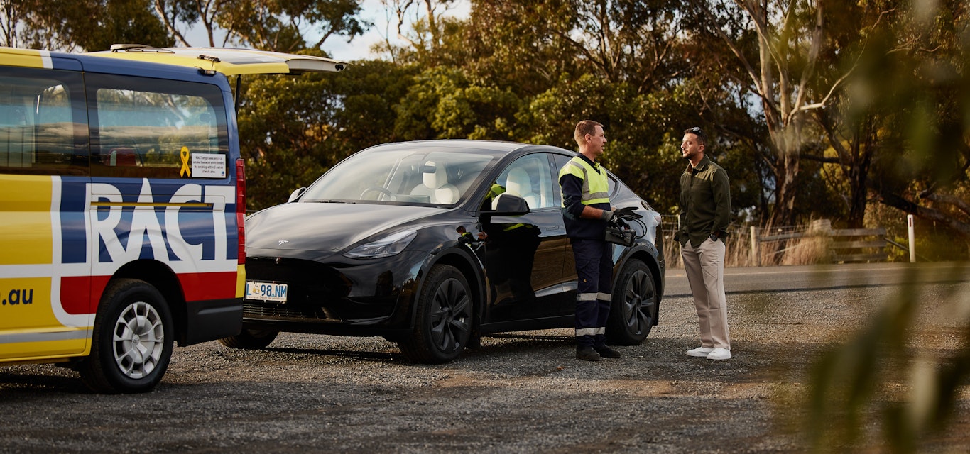 Roadside patrol helping man on the side of the road