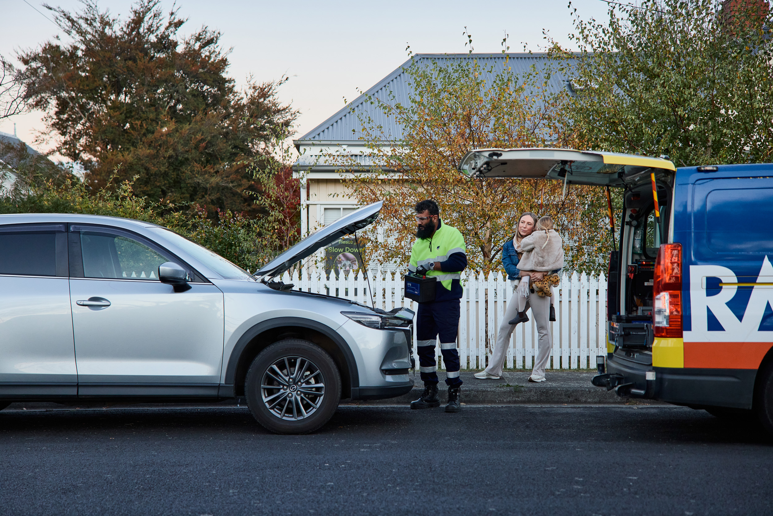 Roadside patrol helping member on the side of the road