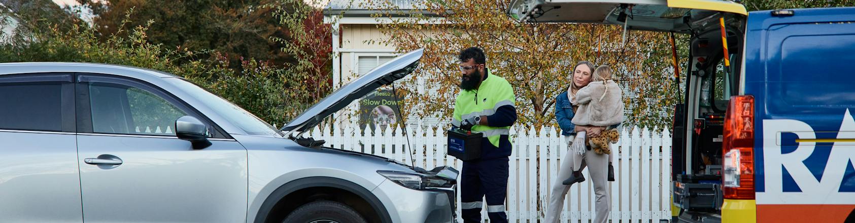 Roadside patrol helping member on the side of the road