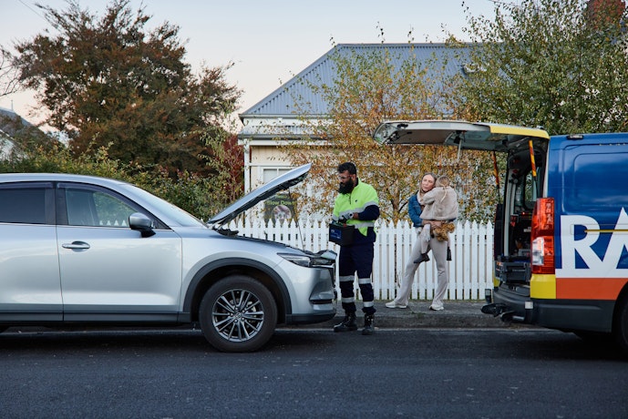 Roadside patrol helping member on the side of the road