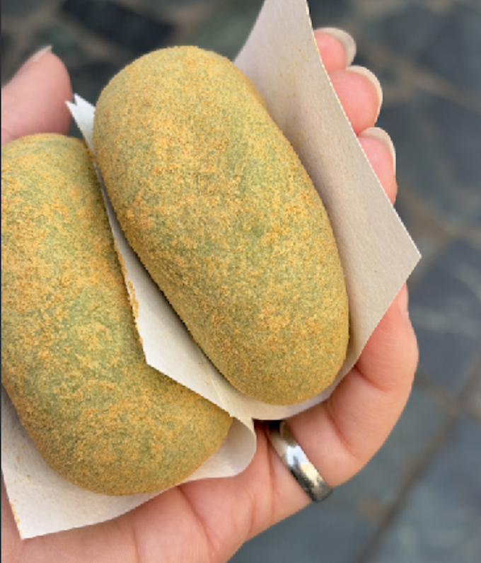 A person holding mochi in Japan