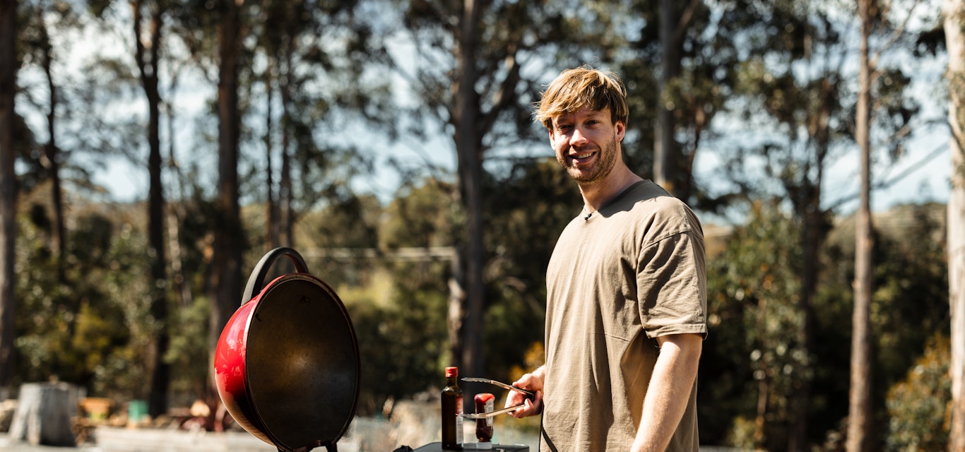Louis cooking on a BBQ
